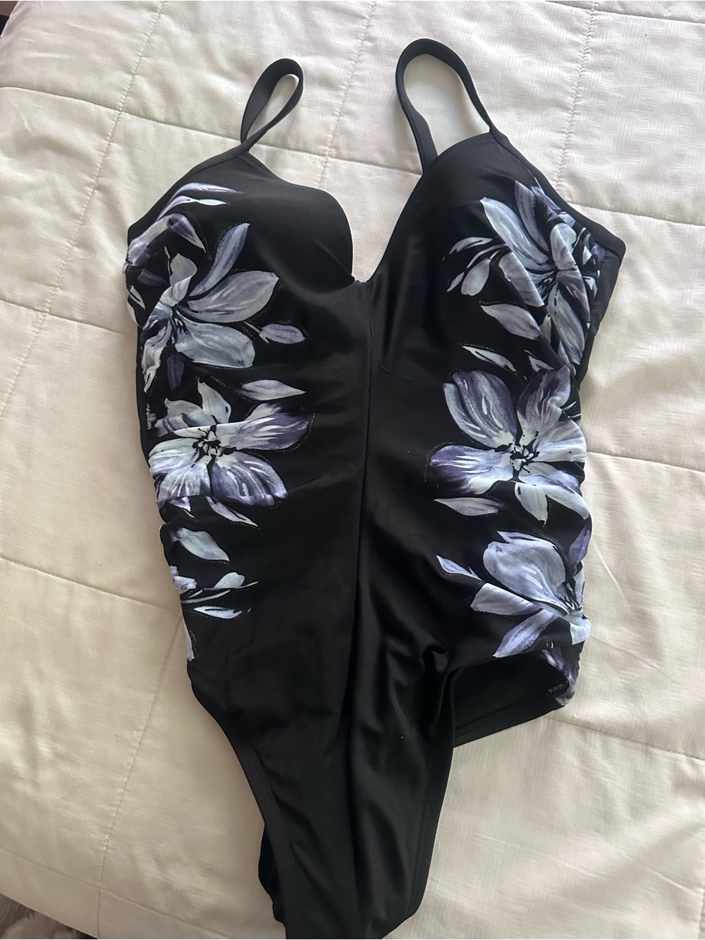 Black One-Piece Swimsuit with White & Lavender Floral Print. Miracle suit.